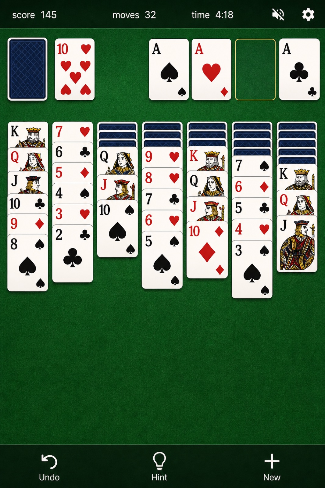 Classic Solitaire board with green felt and seven tableau columns